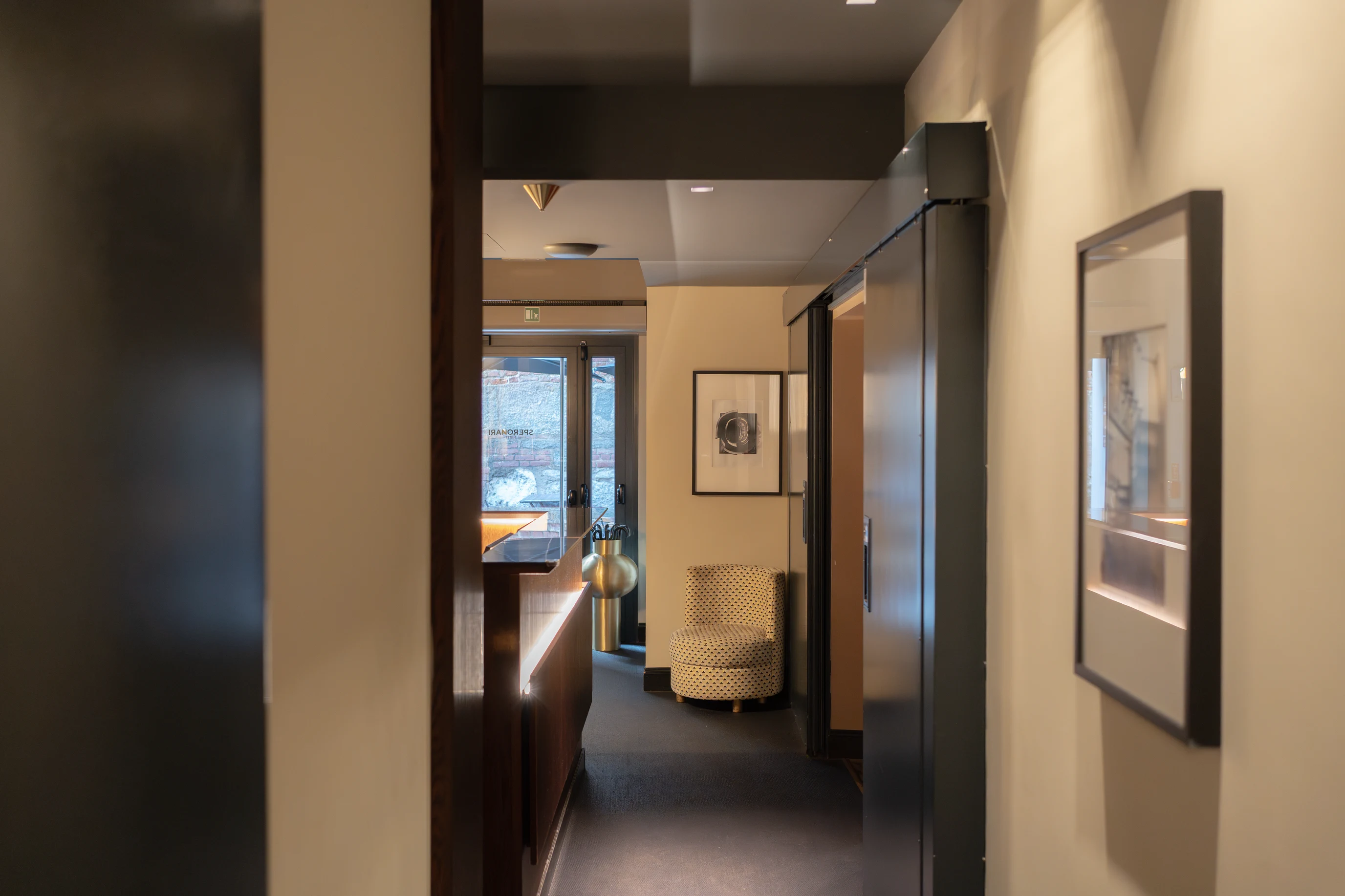 A glimpse — indoor and outdoor, the house opens to the city