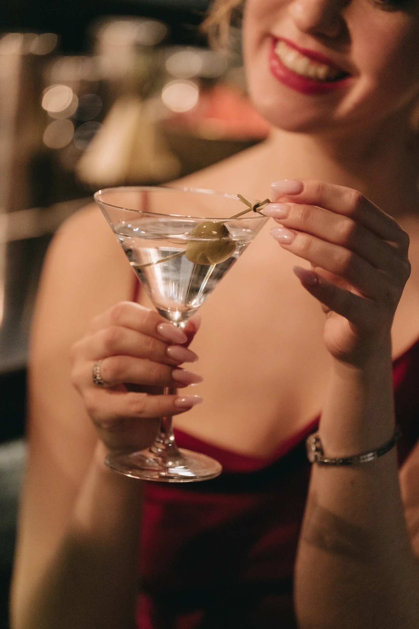 A martini, a smile — an evening begins