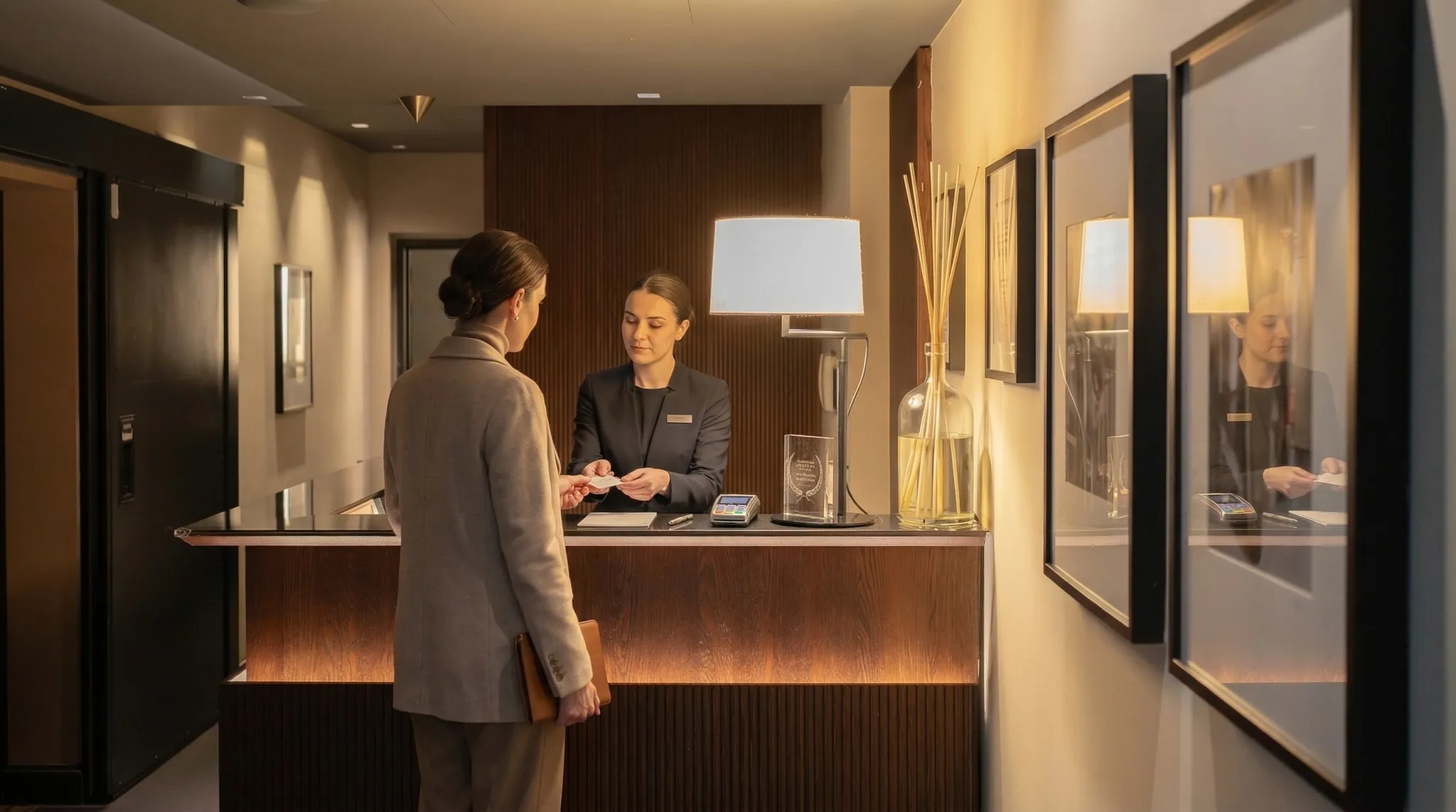 Speronari Suites — a guest arriving at the reception