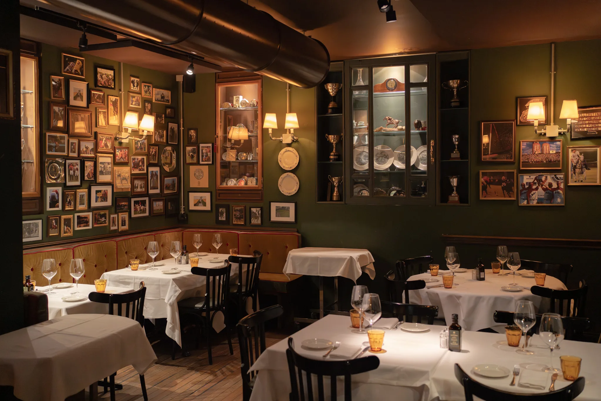 El Porteño dining room — red velvet, warm ambiance