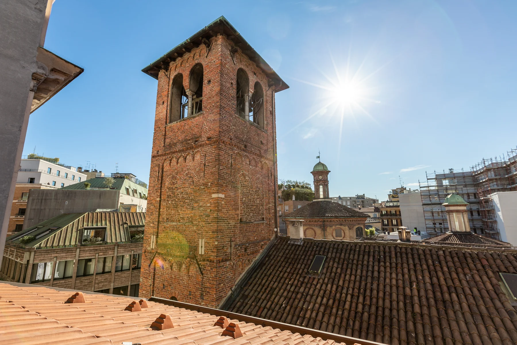 Ken Scott Experience — view of the bell tower of Santa Maria presso San Satiro and Milan rooftops